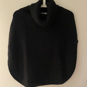 Black knit poncho to keep you warm